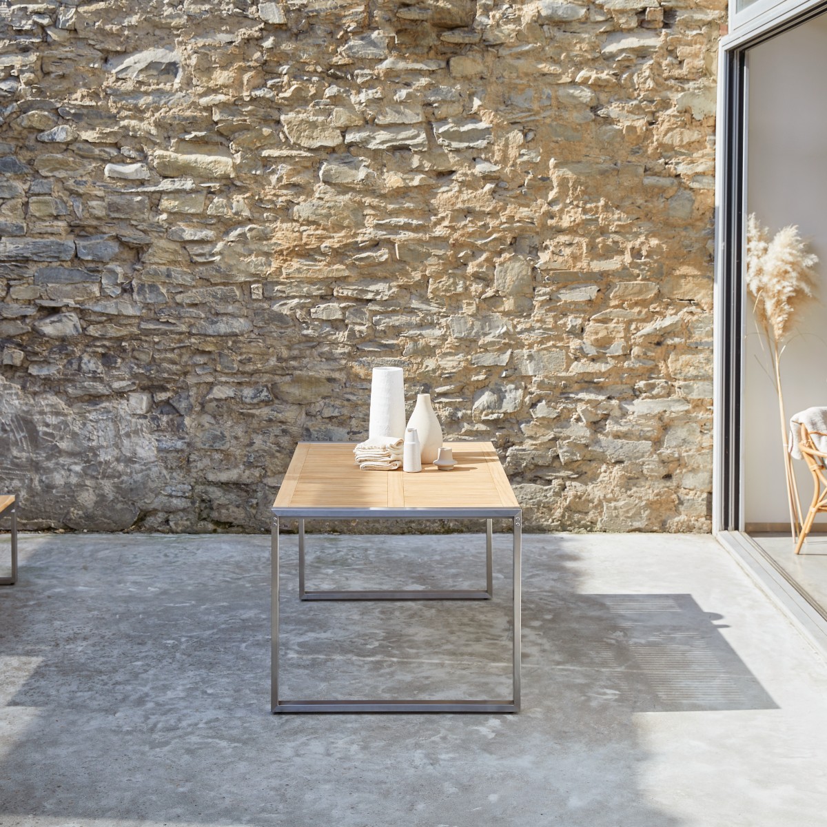 Arno - Outdoor Tisch aus massivem Teak und Edelstahl 4/6 Pers.