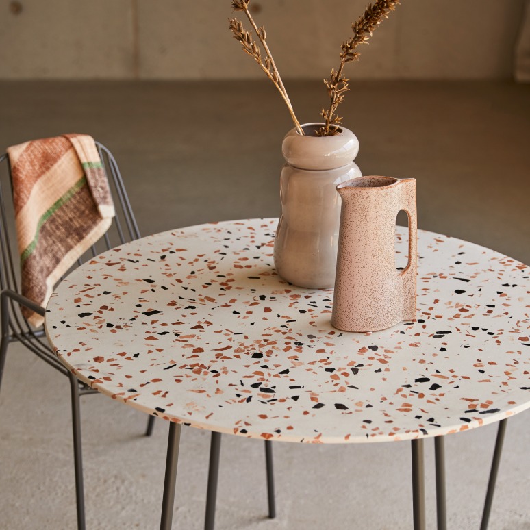 Elio - Round table in premium terrazzo and brown metal, seats 4.