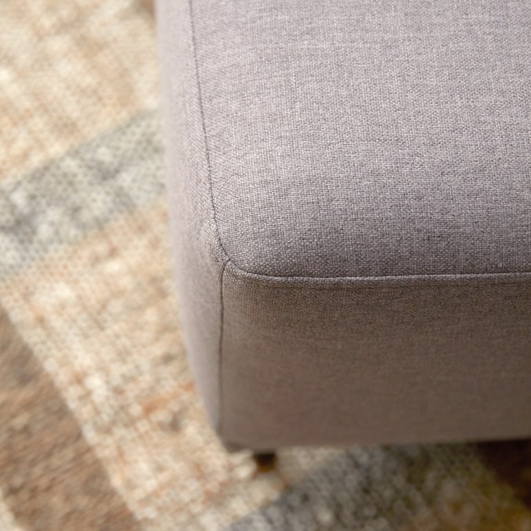 Lars - Footstool in taupe grey fabric