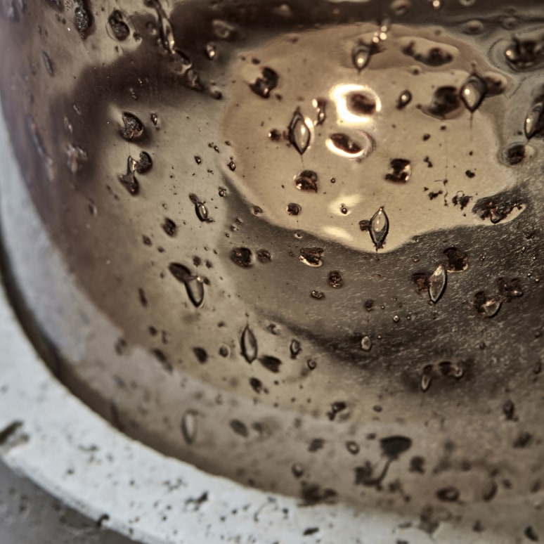 Rivo - Candelabro de cristal y travertino