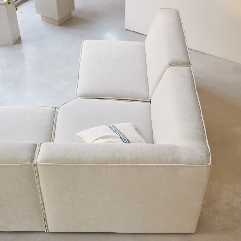 Dario - Divano angolare modulabile in tessuto beige, 4-5 posti