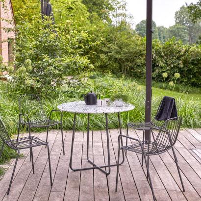 Elio
- Grey round premium terrazzo and metal table